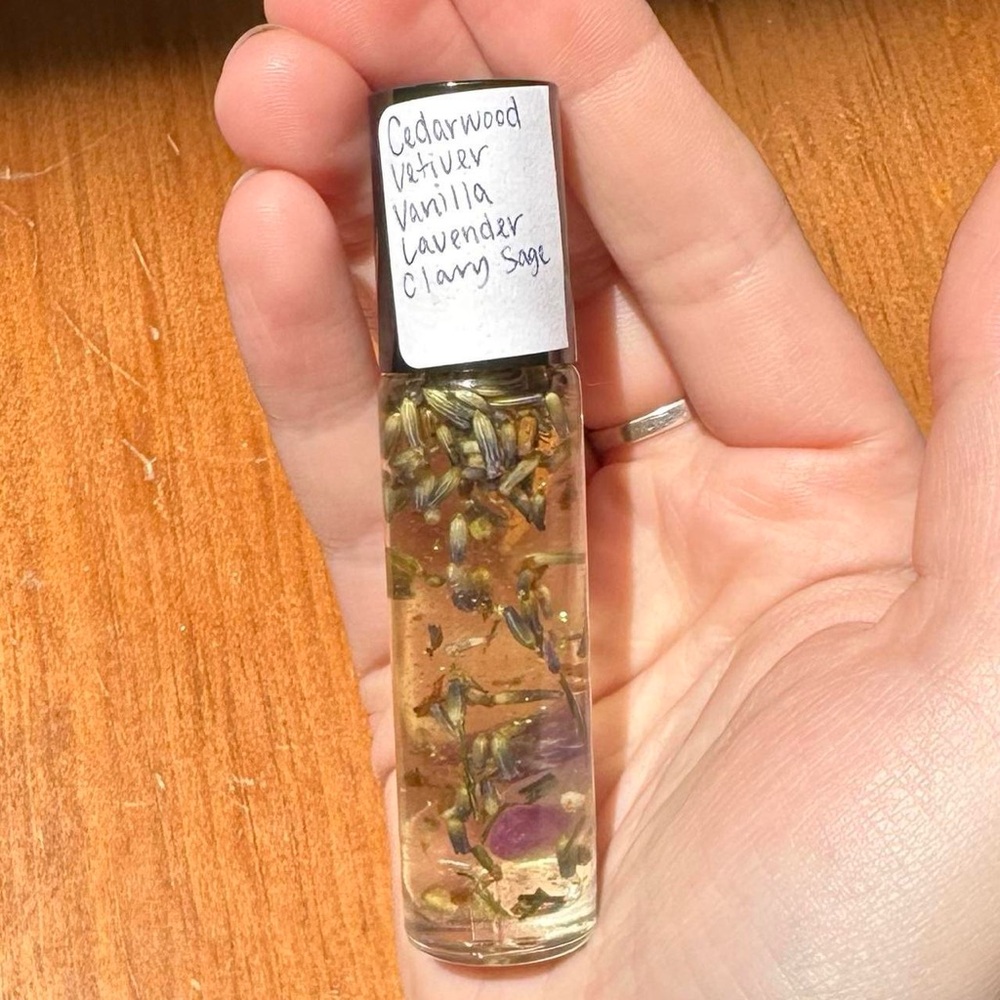 essential oil roller with cedar wood, vetiver, lavender, vanilla, clary sage